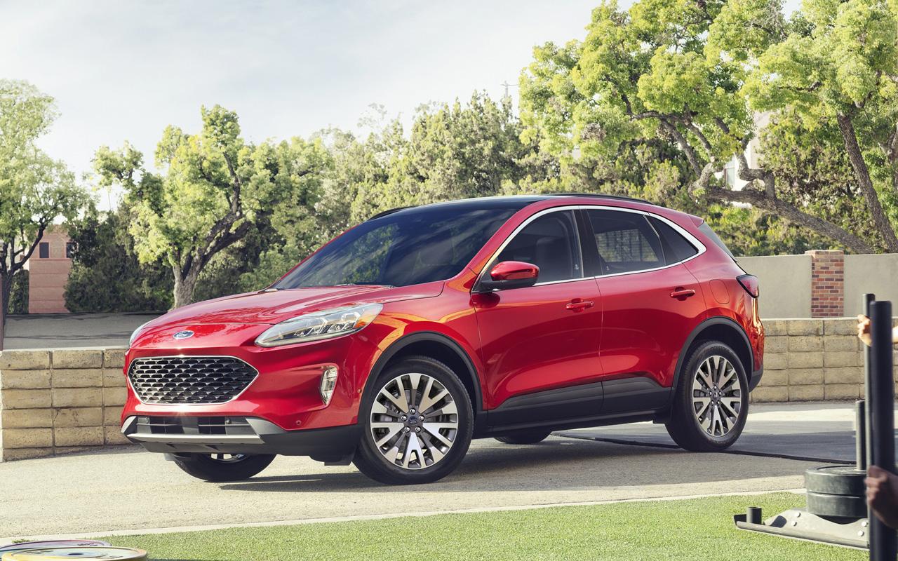 2022 Ford Escape parked in a driveway of a quiet neighborhood