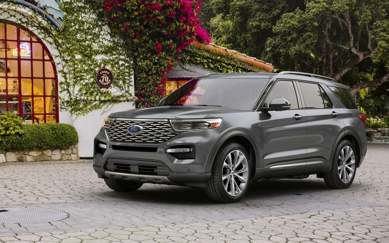 2022 Ford Explorer Platinum parked in front of a house