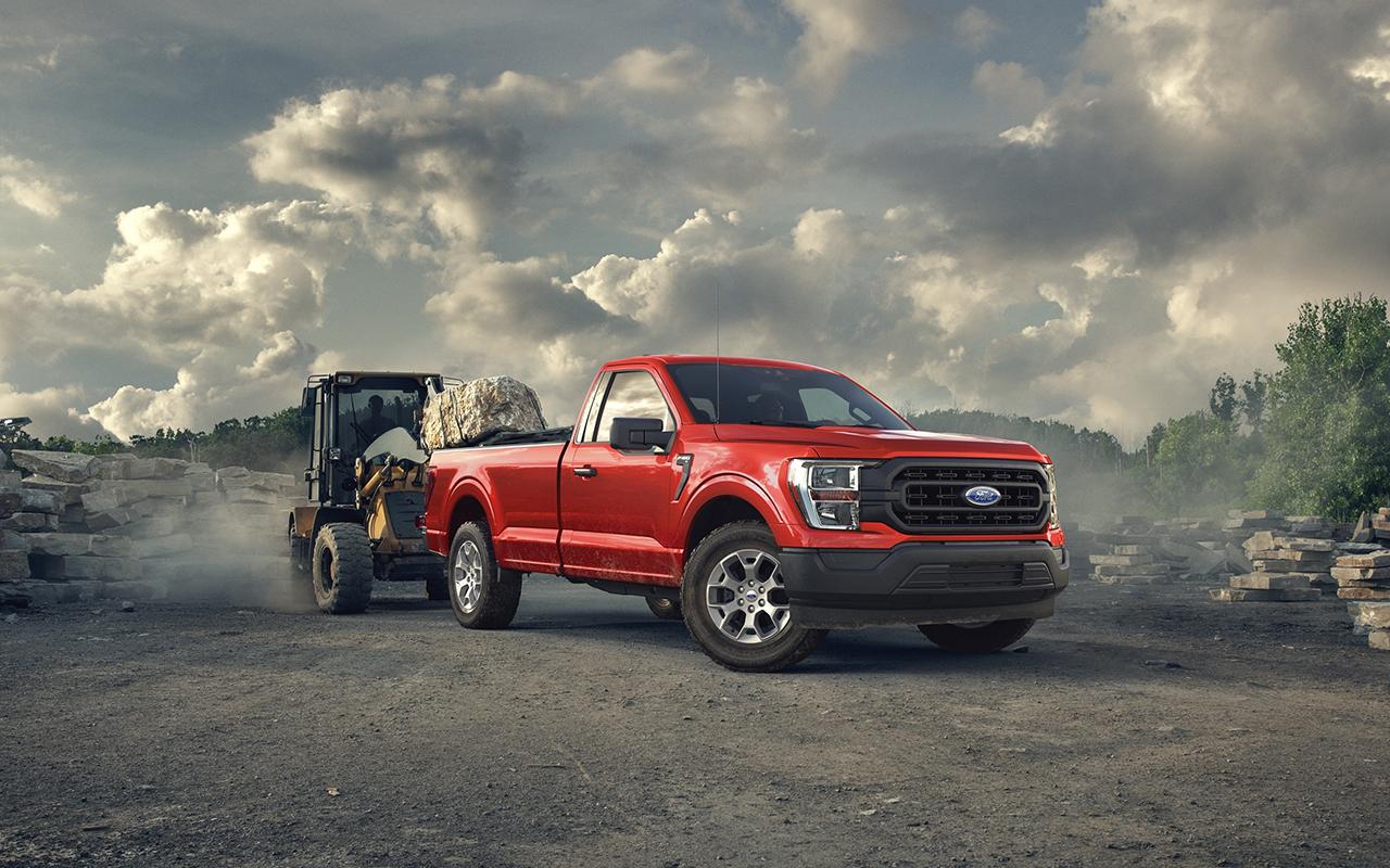 2022 Ford F-150 towing a huge rock at a jobsite