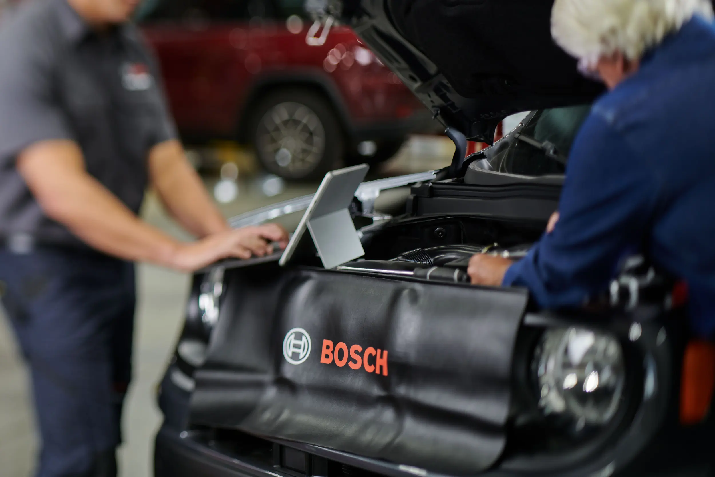 Bosch Auto Service auto repair mechanic repairing a vehicle
