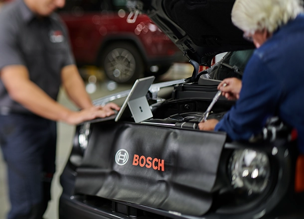 Bosch Auto Service technicians repairing a vehicle