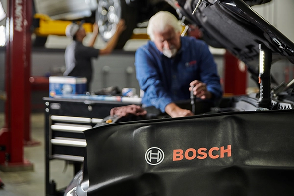 Bosch Auto Service technicians repairing engine fuel systems
